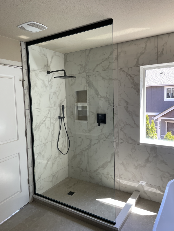 Screenshot 2025-09-30 at 8.32.01 PM Walk in shower with large glass panel