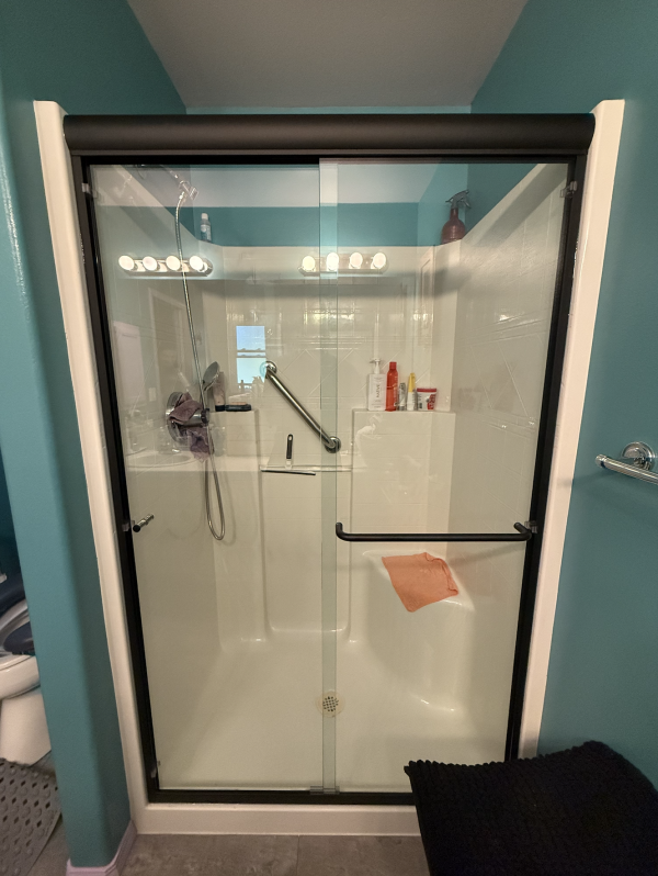Screenshot 2025-09-30 at 8.32.31 PM Sliding glass doors on walk in shower