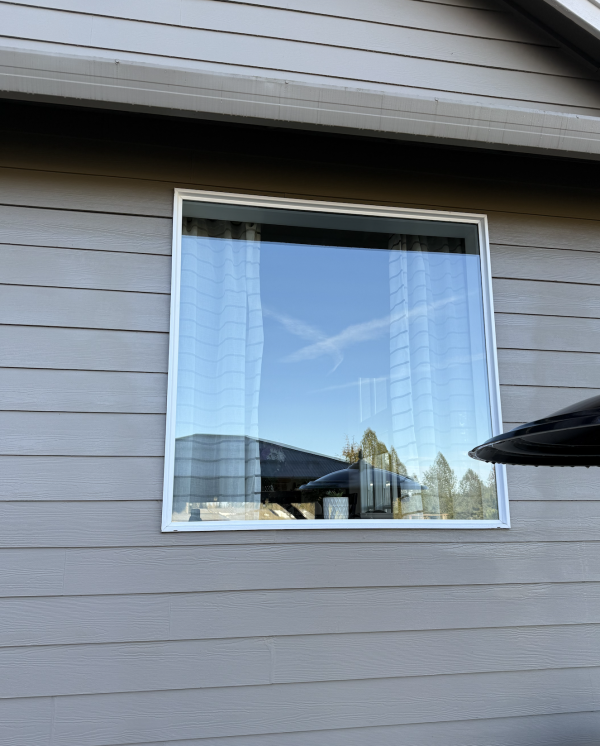 Screenshot 2025-09-30 at 8.34.48 PM Large glass window on a house